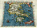 Engraved antique map of Greece based on Ptolemy's coordinates.